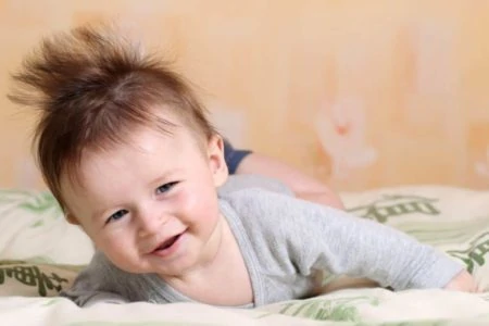 Smiling boy with mohawk