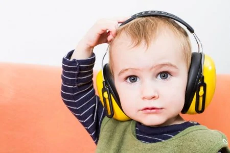 toddler wearing headphones