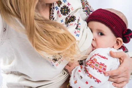 Baby girl wearing a headband with hair loss