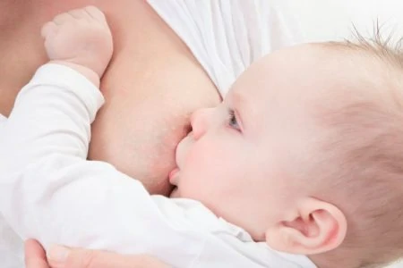 Mother breastfeeding her baby