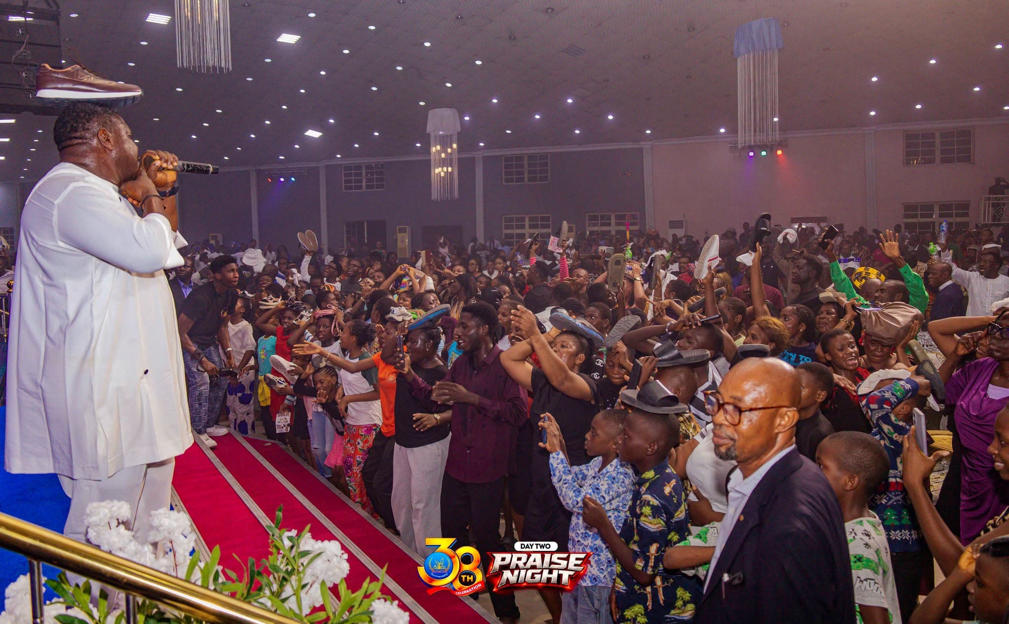 The congregation on their feet celebrating during a praise night service
